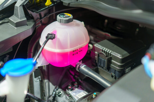 Pink Liquid Antifreeze in Coolant Tank